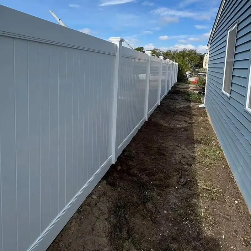 7ft Tall 2 Rails White Vinyl Privacy Fence in residential